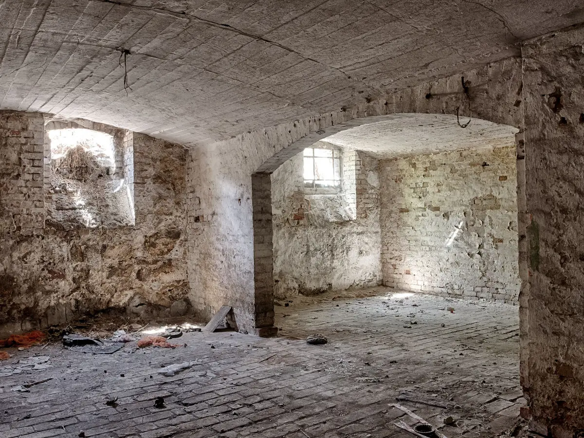 Old stone foundation walls in a basement